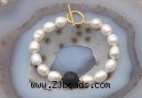 CFB978 Hand-knotted 9mm - 10mm rice white freshwater pearl & black lava bracelet