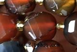 TWIS05 15 inches 9*10mm faceted twisted red agate beads