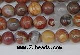 CAA1221 15.5 inches 6mm round gold mountain agate beads