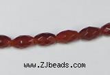 CAA124 15.5 inches 6*10mm faceted rice red agate gemstone beads