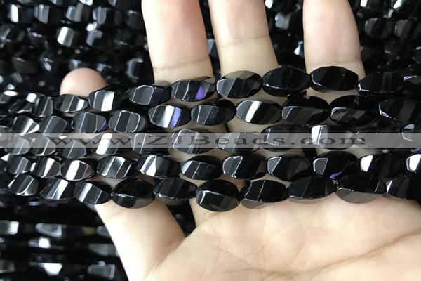 CAA2490 15.5 inches 6*12mm faceted & twisted rice black agate beads