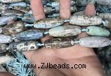 CAA2755 15.5 inches 12*38mm - 14*40mm rice agate beads wholesale