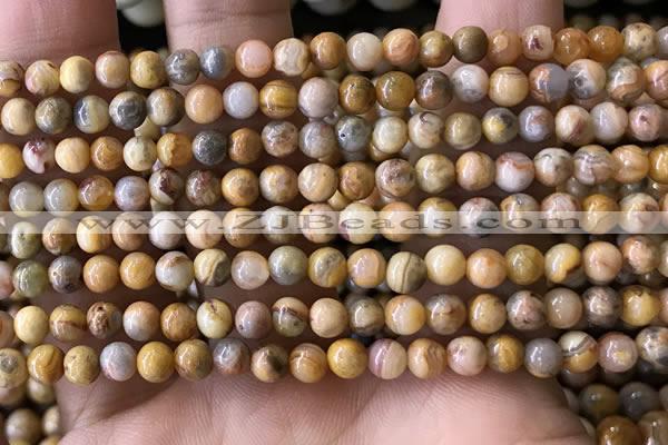 CAA3601 15.5 inches 4mm round yellow crazy lace agate beads