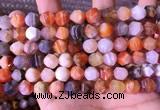 CAA3763 15.5 inches 10mm faceted nuggets mixed botswana agate beads