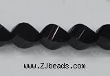 CAB336 15.5 inches 10*14mm faceted & twisted rice black agate beads