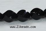 CAB337 15.5 inches 15*20mm faceted & twisted rice black agate beads