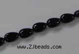 CAB744 15.5 inches 6*8mm flat teardrop black agate gemstone beads