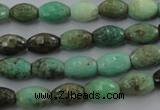 CAG1606 15.5 inches 8*10mm faceted rice green grass agate beads