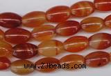 CAG1646 15.5 inches 8*12mm rice red agate gemstone beads