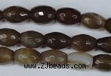 CAG3129 15.5 inches 10*14mm faceted rice brown line agate beads