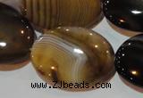 CAG3498 15.5 inches 22*30mm oval brown line agate beads