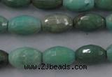 CAG3918 15.5 inches 6*10mm faceted rice green grass agate beads