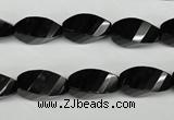 CAG4009 15.5 inches 8*16mm faceted & twisted rice black agate beads