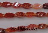 CAG4180 15.5 inches 6*12mm faceted & twisted rice natural fire agate beads