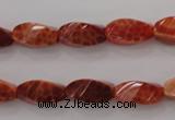 CAG4181 15.5 inches 7*14mm faceted & twisted rice natural fire agate beads