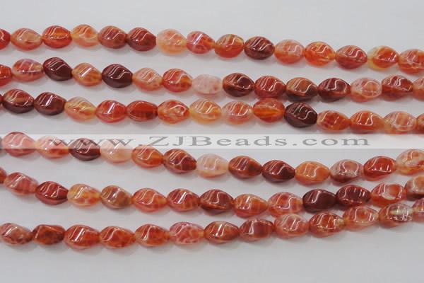 CAG4184 15.5 inches 6*10mm twisted rice natural fire agate beads