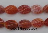 CAG4238 15.5 inches 10*14mm twisted oval natural fire agate beads