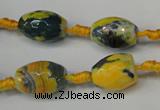 CAG5774 15 inches 10*14mm faceted rice fire crackle agate beads