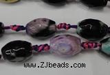 CAG5775 15 inches 10*14mm faceted rice fire crackle agate beads