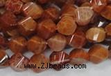 CAG582 15.5 inches 10*14mm faceted & twisted rice natural fire agate beads