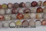 CAG9860 15.5 inches 4mm faceted round Mexican crazy lace agate beads