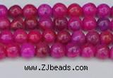 CAG9924 15.5 inches 4mm round fuchsia crazy lace agate beads