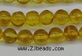 CAR551 15.5 inches 6mm - 7mm round natural amber beads wholesale