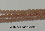 CBQ08 15.5 inches 6mm faceted round strawberry quartz beads