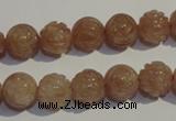 CBQ14 15.5 inches 10mm carved round strawberry quartz beads