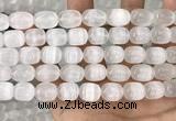 CCA380 15.5 inches 10*12mm rice white calcite gemstone beads