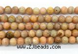 CCA553 15.5 inches 10mm round peach calcite gemstone beads