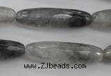 CCQ293 15.5 inches 10*35mm faceted rice cloudy quartz beads