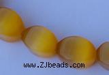 CCT26 14 inches 10*14mm twisted honey yellow cats eye beads wholesale