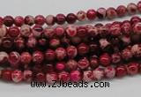 CDE01 15.5 inches 4mm round dyed sea sediment jasper beads