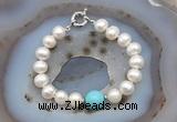 CFB1016 Hand-knotted 9mm - 10mm potato white freshwater pearl & blue howlite bracelet