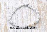 CFB700 faceted rondelle white howlite & potato white freshwater pearl stretchy bracelet