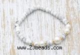 CFB702 faceted rondelle white howlite & potato white freshwater pearl stretchy bracelet