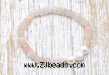 CFB710 faceted rondelle pink aventurine & potato white freshwater pearl stretchy bracelet