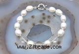 CFB908 Hand-knotted 9mm - 10mm rice white freshwater pearl & white crystal bracelet