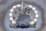 CFB930 Hand-knotted 9mm - 10mm rice white freshwater pearl & sodalite bracelet