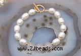 CFB934 Hand-knotted 9mm - 10mm rice white freshwater pearl & rose quartz bracelet