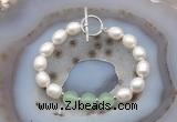 CFB992 Hand-knotted 9mm - 10mm rice white freshwater pearl & candy jade bracelet