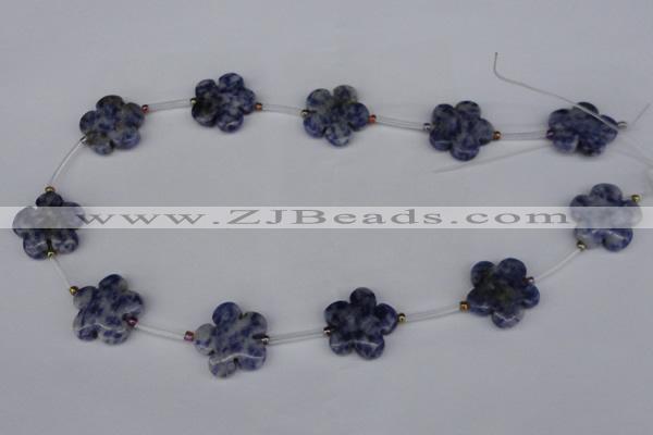 CFG1006 15.5 inches 20mm carved flower blue spot stone beads