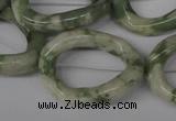 CFG270 15.5 inches 25*30mm carved oval peace stone beads