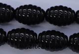 CFG759 15.5 inches 15*20mm carved rice black agate beads