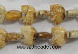 CFG778 15.5 inches 10*15mm carved animal picture jasper beads