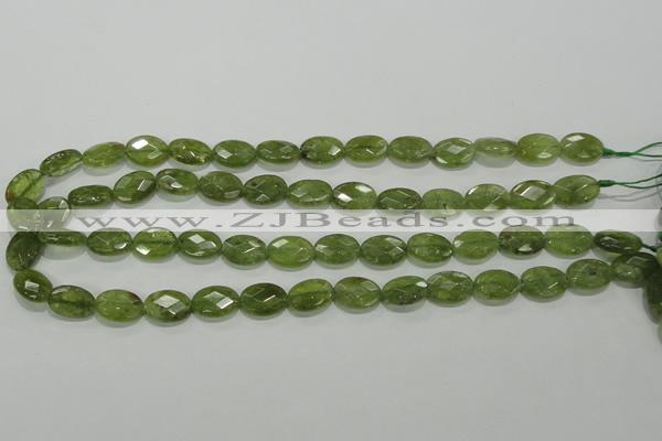 CGA101 15.5 inches 10*14mm faceted oval natural green garnet beads