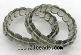 CGB3463 7.5 inches 10*14mm faceted oval smoky quartz bracelets