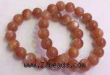 CGB4541 7.5 inches 12mm - 13mm round golden sunstone beaded bracelets