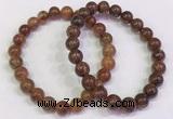 CGB4601 8mm - 9mm round golden rutilated quartz beaded bracelets